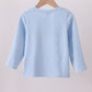 Blue construction embroidery top