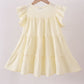 Yellow cross sequin tiered dress