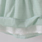 Green swiss dot cross sheep ruffle dress