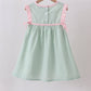 Green swiss dot cross sheep ruffle dress