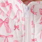 Pink bow ruffle vest