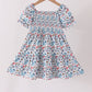 Blue floral smocked ruffle dress