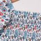 Blue floral smocked ruffle dress