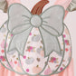 Pink pumpkin bow applique ruffle romper