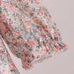 Floral smocked lace dress