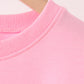 Pink football sequin mom&me top
