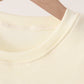 Beige character french knot top