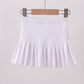 White pleated skort