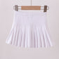 White pleated skort