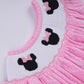 Pink character hand smocked dot ruffle bubble