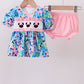 Pink character smocked ruffle bloomer set