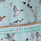 Green duck print backpack