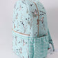Green duck print backpack