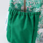 Green floral ruffle backpack