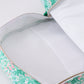 Green floral ruffle backpack