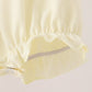 Cream smocked bow bubble