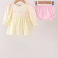 Cream smocked bow bloomer set