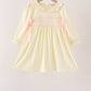 Cream smocked bow dress