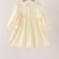 Cream smocked bow dress